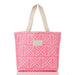 A pink tote bag with a white geometric pattern and beige shoulder straps, featuring a small beige brand patch on the front.