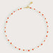 necklace with multi colored pink beads on a white background