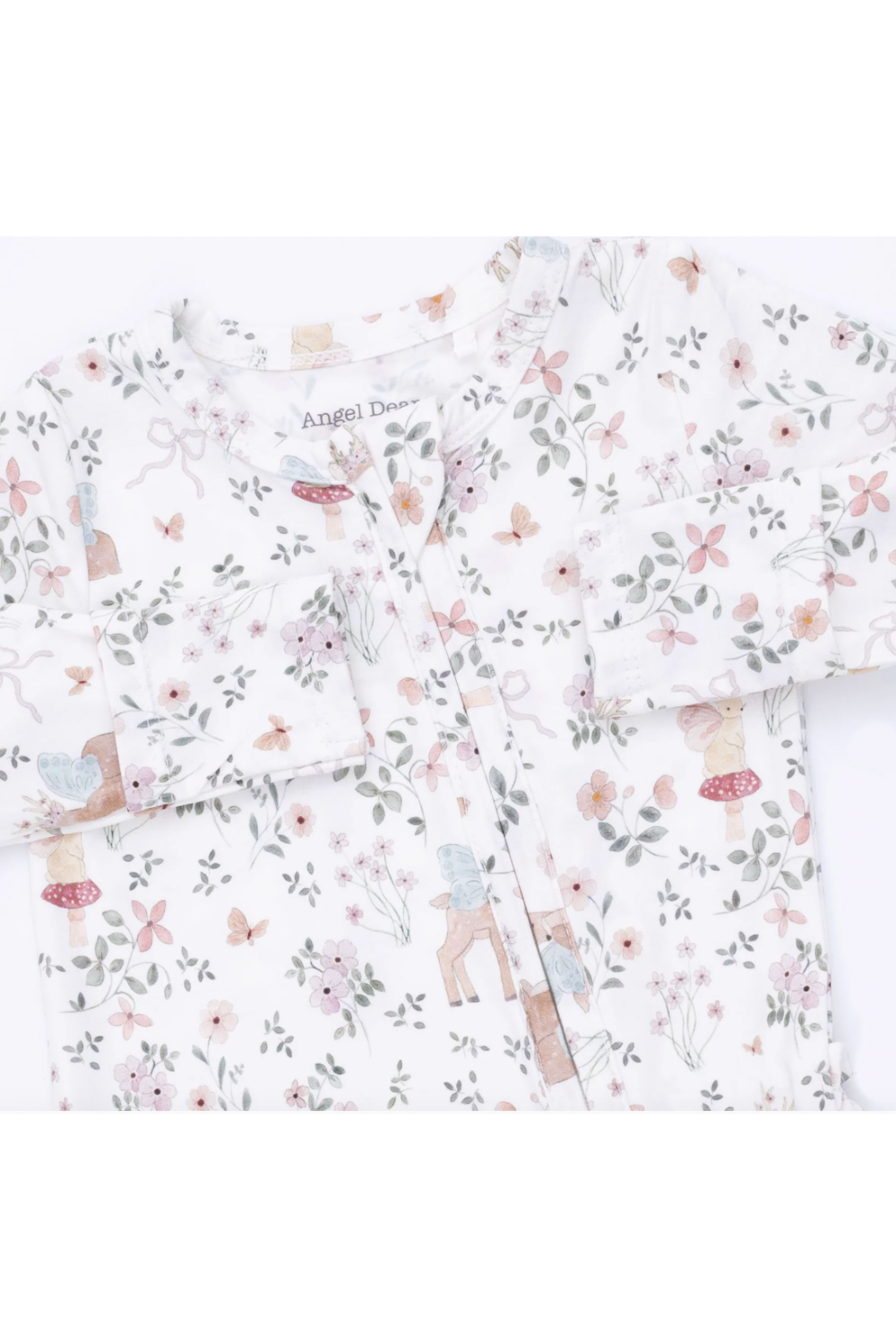 A long-sleeve baby pajama top with a white base, featuring a delicate pastel print of flowers, butterflies, and woodland animals. The brand name 'Angel Dream' is visible on the inner neck label.