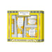 Beekman 1802 Kindness Cafe gift set containing four bath and body products: hand cream, lotion, shower gel, and soap, presented in a yellow and white patterned box.