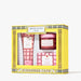 Beekman 1802 Kindness Cafe gift set in a bright yellow box with decorative borders. The set includes a pink and red strawberry body wash tube, a pink and red strawberry hand cream jar, and a pink and red strawberry shower gel box, all visible through a clear window.