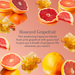 A pink fragrance-themed graphic with the text 'Honeyed Grapefruit' and a descriptive scent note, surrounded by floating grapefruit slices, whole grapefruit, honeycomb, and orange slices on a pink background.