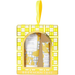 Beekman 1803 Honey & Orange Blossom gift set in a yellow and white patterned box with a hanging loop, containing a goat milk hand cream and lip balm tube.