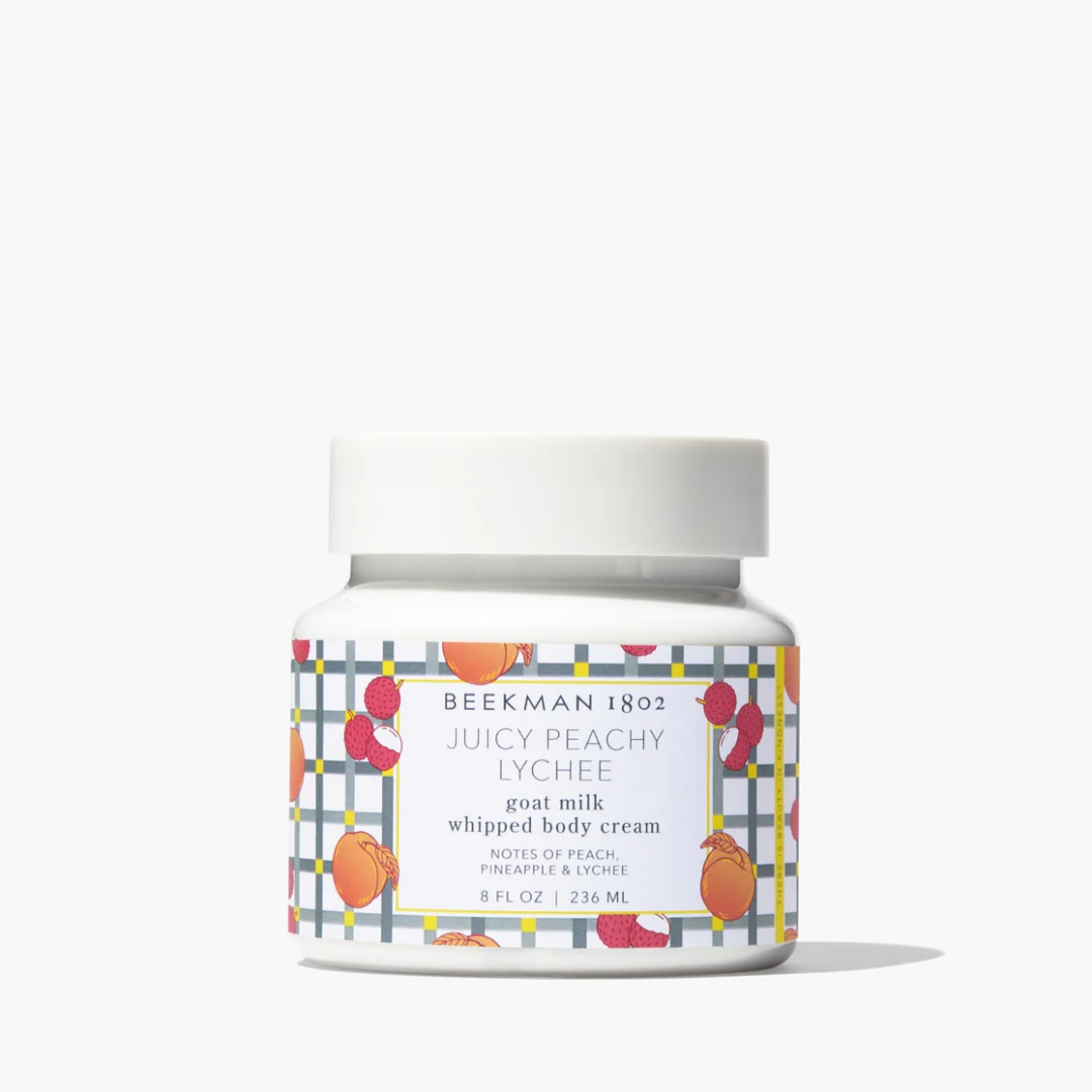 Jar of Beekman 1802 Juicy Peachy Lychee whipped body cream on a white background