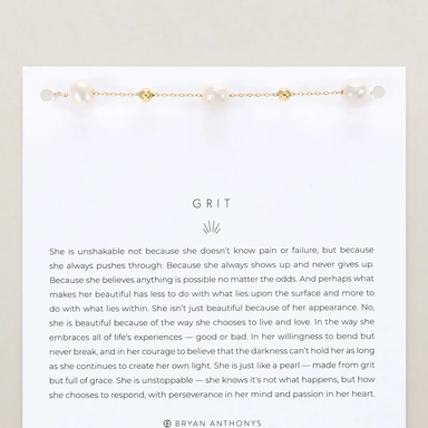 Text on a white background with a gold chain and pearls at the top.