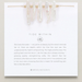 Jewelry set with 'Tide Within' description and branding on a white card.