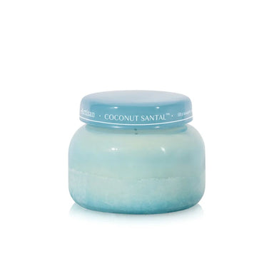 A single jar of Scents of Armenia Coconut Santal candle wax on a clean white background. The jar is a soft, translucent light blue with a matching blue lid featuring white text.