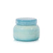 A single jar of Scents of Armenia Coconut Santal candle wax on a clean white background. The jar is a soft, translucent light blue with a matching blue lid featuring white text.