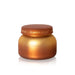 A round cosmetic jar with a metallic copper-to-gold gradient body and a matching lid, featuring the text 'Artisan PUMPKIN DULCE' on the lid, set against a plain white background.