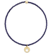 Navy blue beaded braclet with a gold star pendant on a white background