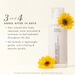 A clear pump bottle labeled 'GOOD GRAVITY' by The Healing Press, shown on a warm off-white background with two yellow flowers and promotional text about skin results after 14 days.