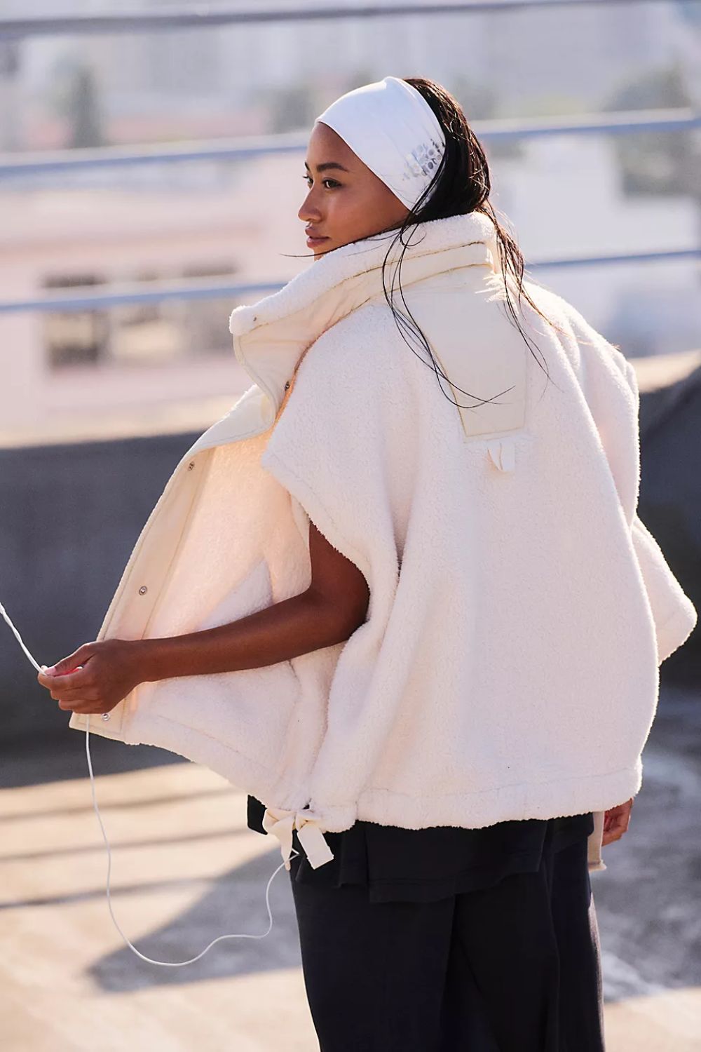 woman wearing Free People Scout It Out Vest in Birch Tree