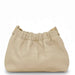 Beige handbag with gold zipper on a white background