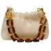 Beige woven handbag with a brown and gold chain strap on a white background