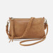 Brown leather crossbody bag with braided strap on a white background