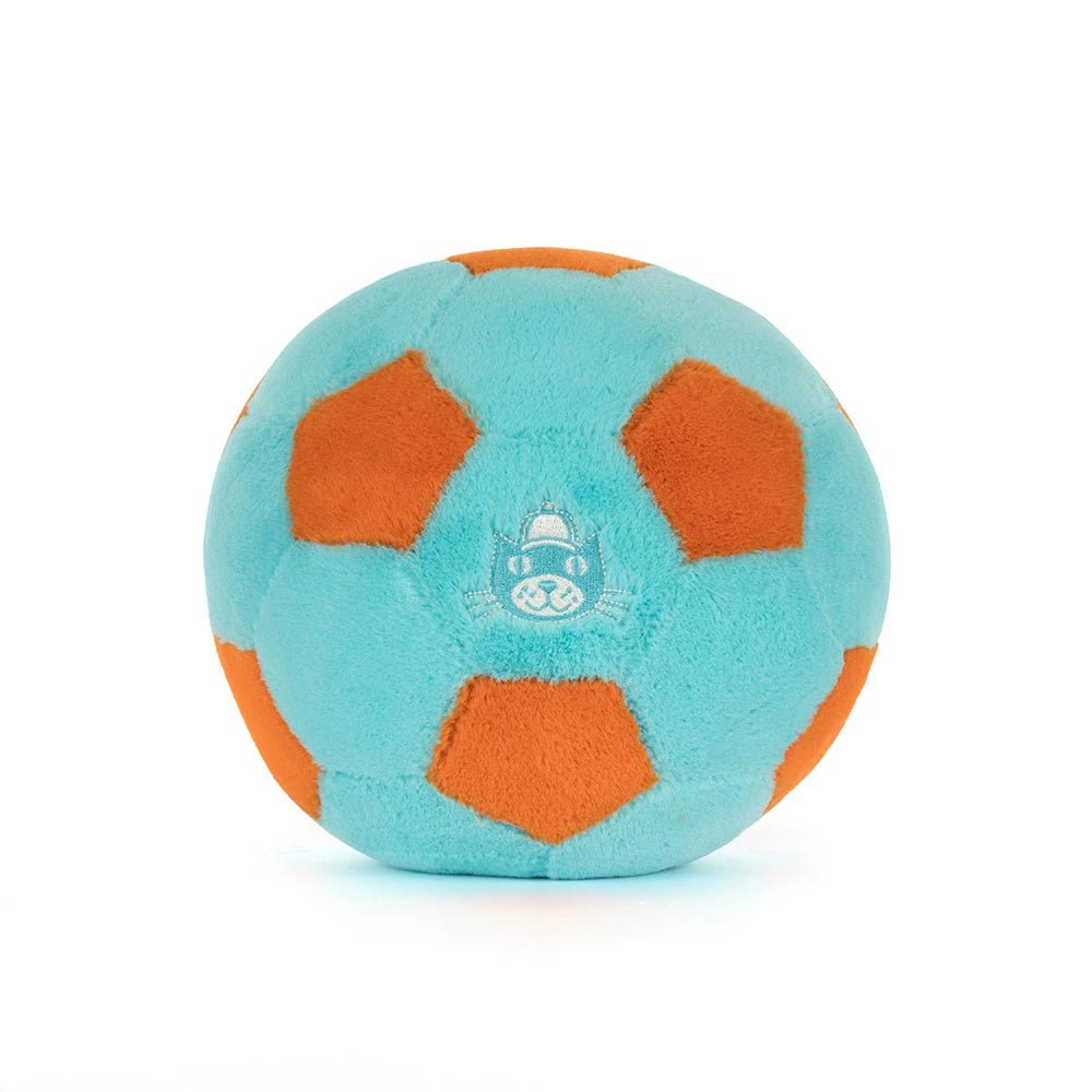 Plush soccer ball with orange panels, side view