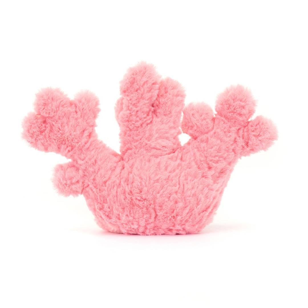 Pink plush toy resembling a hand with open fingers on a white background