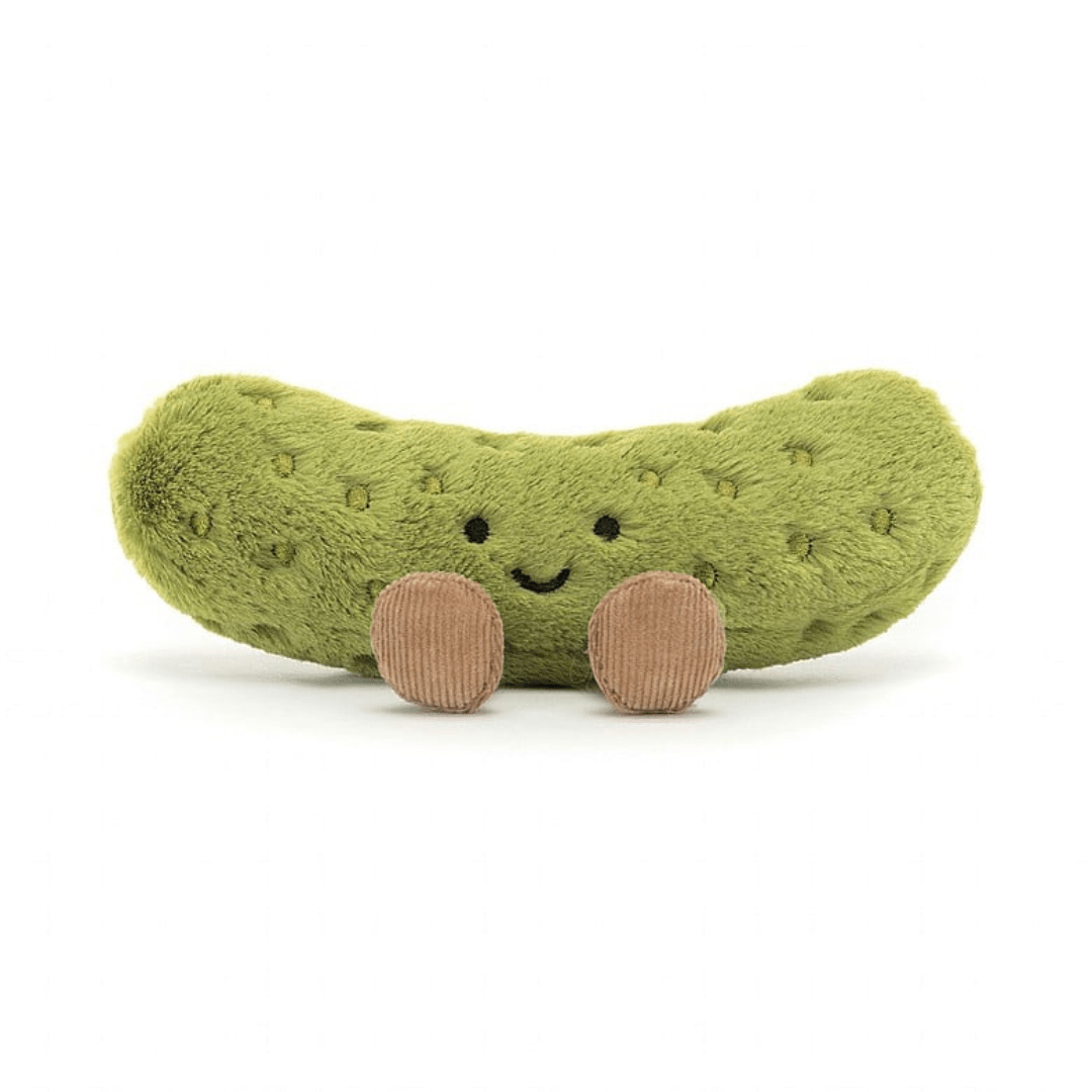 pickle plush with legs against white background