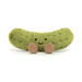 pickle plush with legs against white background