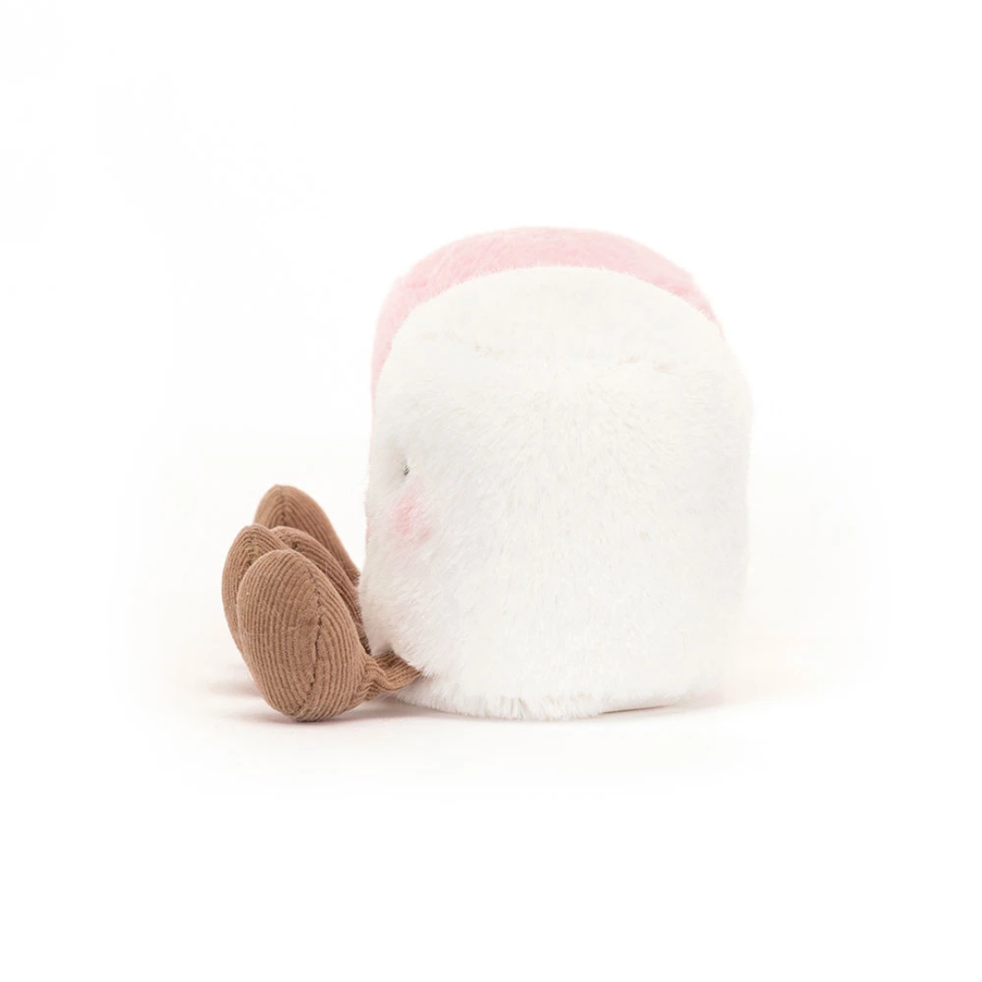 pink and white marshellow plush toy on white background