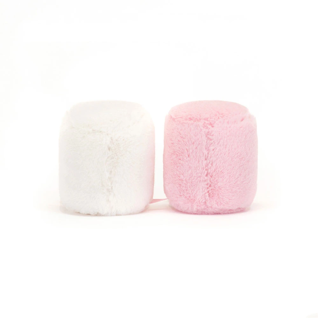 pink and white marshellow plush toy on white background