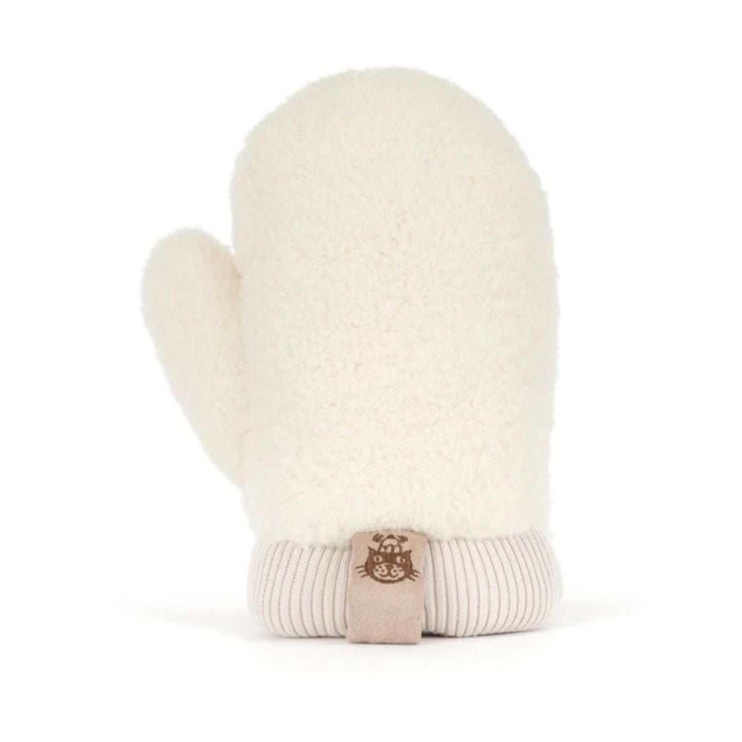 A plush sheepskin bootie pillow in cream and beige, shown from a back profile on a white background.