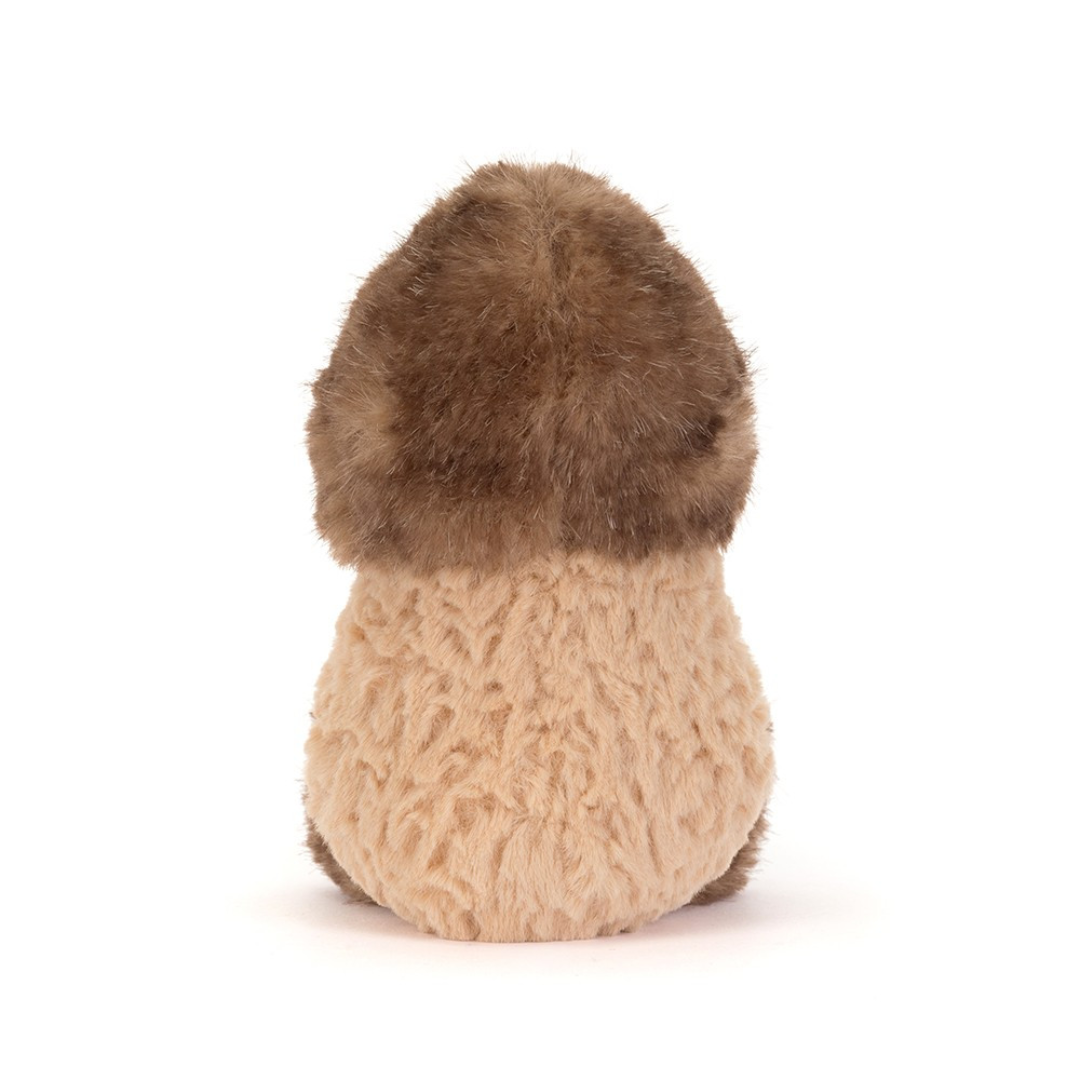 peanut stuffed animal white fur around head and feet against white background