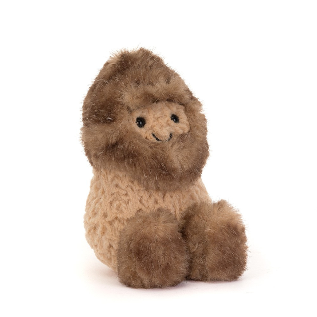 peanut stuffed animal white fur around head and feet against white background