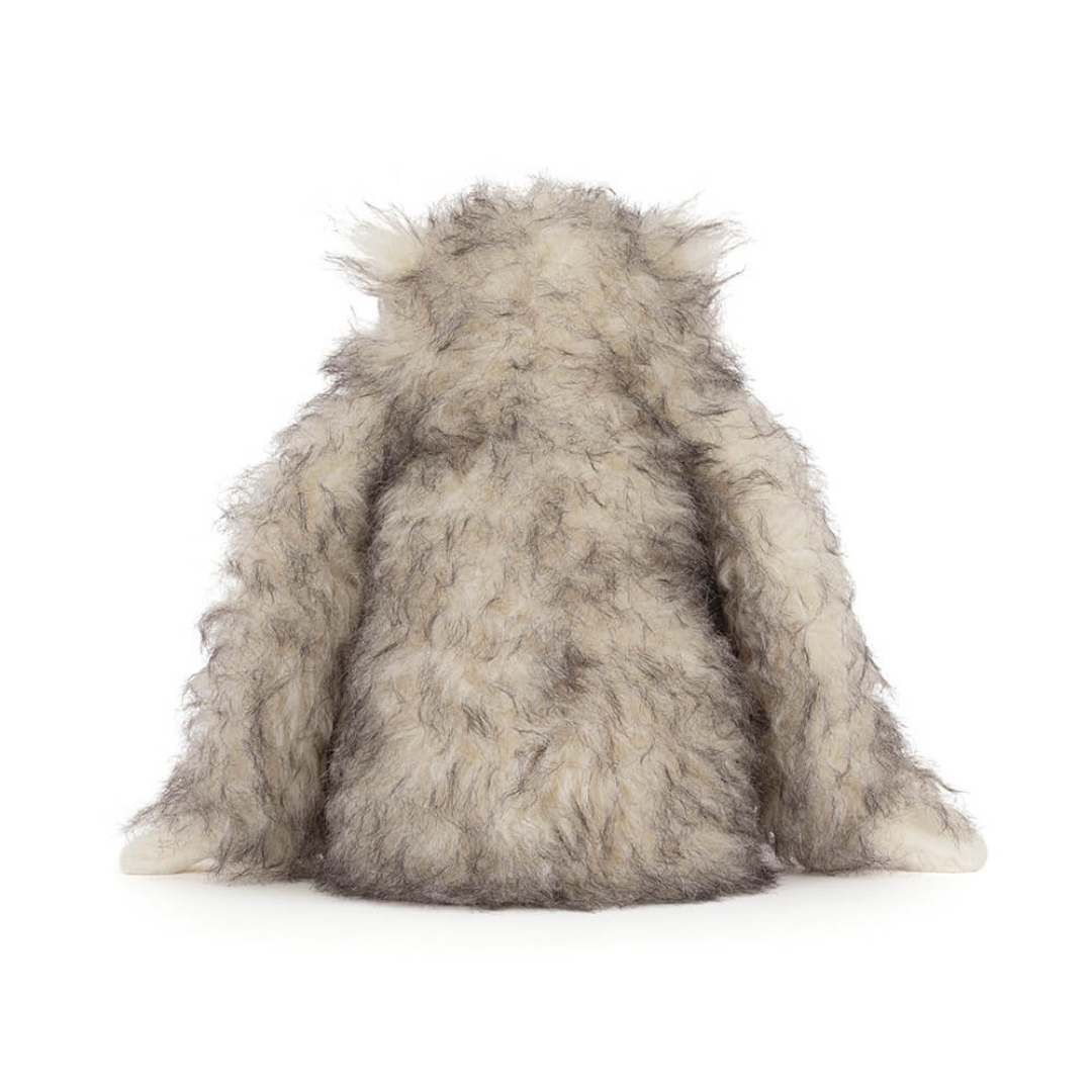yetti stuffed animal on white background