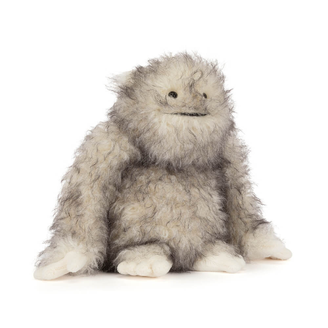 yetti stuffed animal on white background