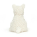 A plush toy resembling a white dog on a white background