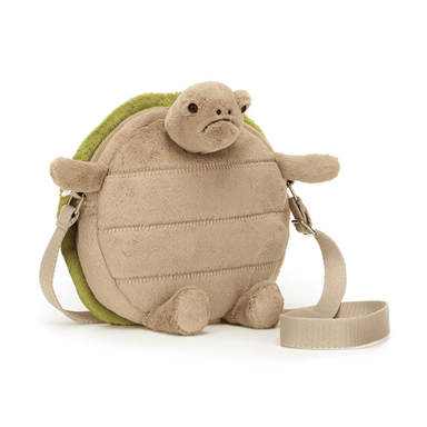 A beige and green plush turtle bag with a textured surface and a silver zipper, featuring a Jellycat tag.