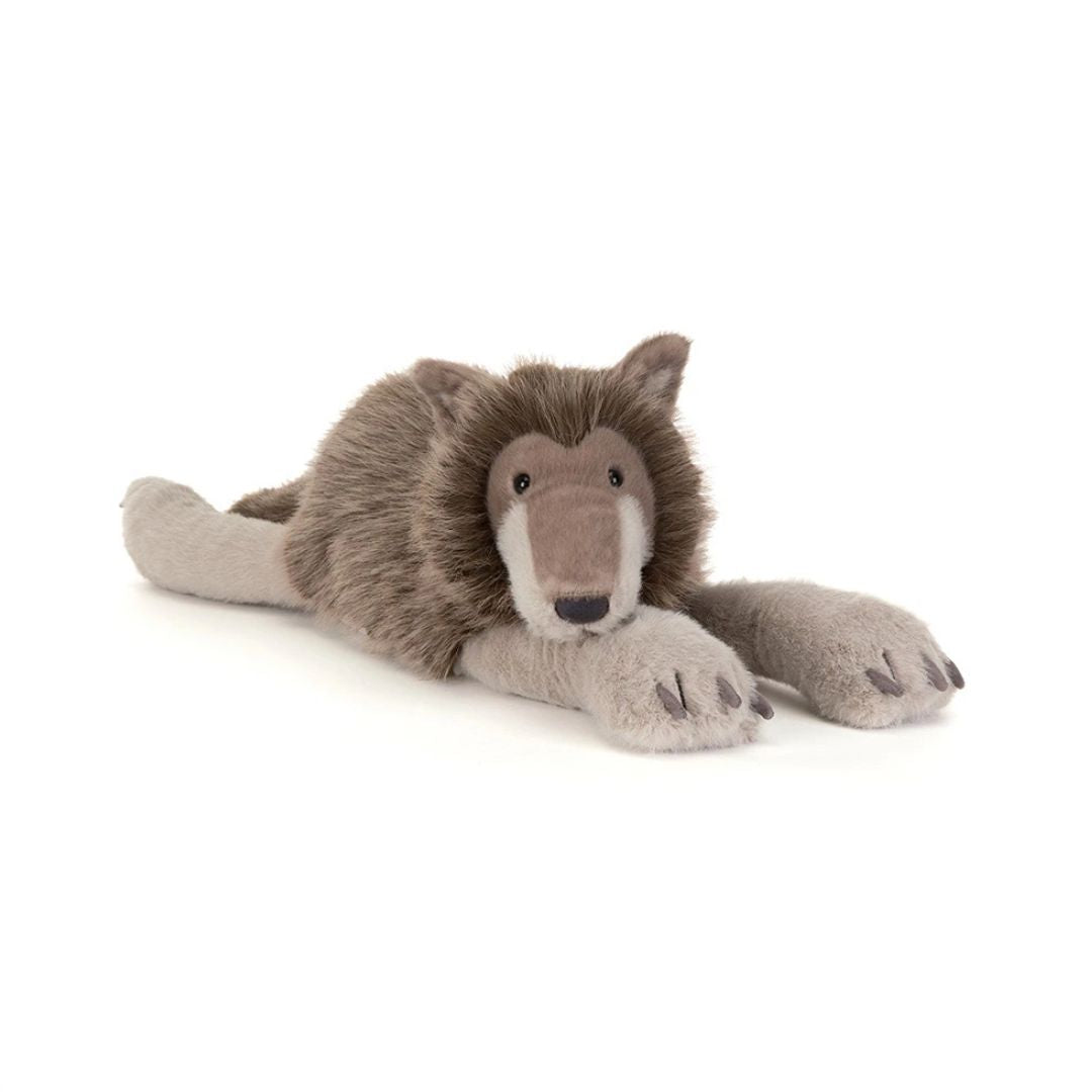 A plush stuffed animal shaped like a wolf or wild cat, lying down on a clean white background. The toy has a brown and gray body with a lighter beige muzzle and gray paws.