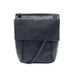 A dark navy blue faux-leather crossbody bag with a front flap pocket and a matching shoulder strap, shown against a plain white background.