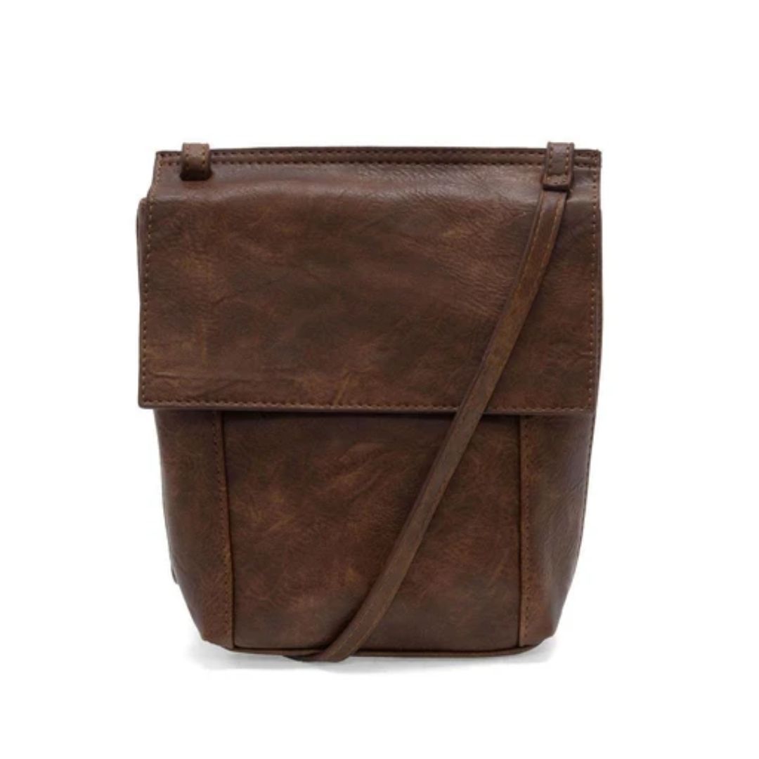 A dark brown distressed leather crossbody bag with a matching shoulder strap, shown against a plain white background.