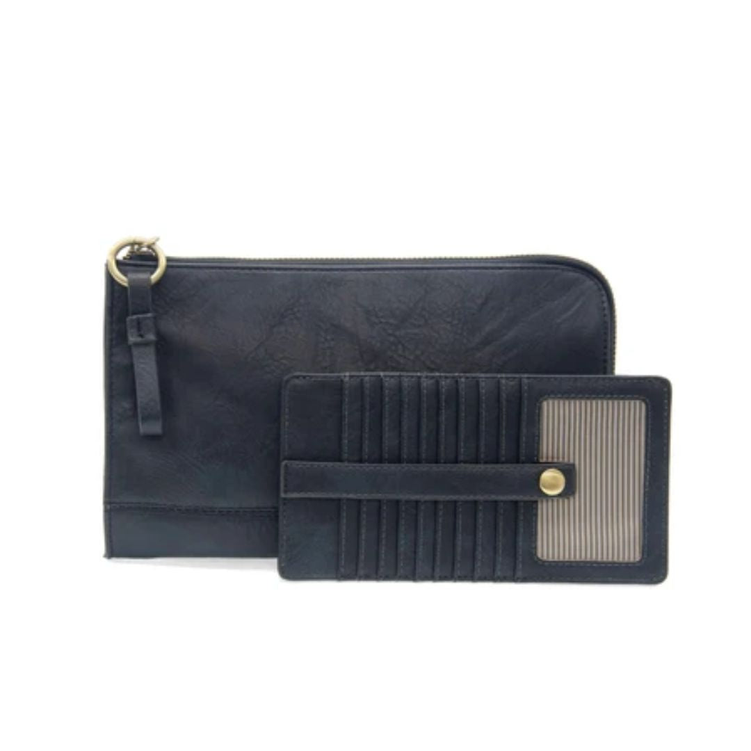 A black faux-leather wallet set featuring a zip-around pouch with a gold-tone ring detail and a matching slim card holder wallet with a ribbed beige panel and gold snap button.