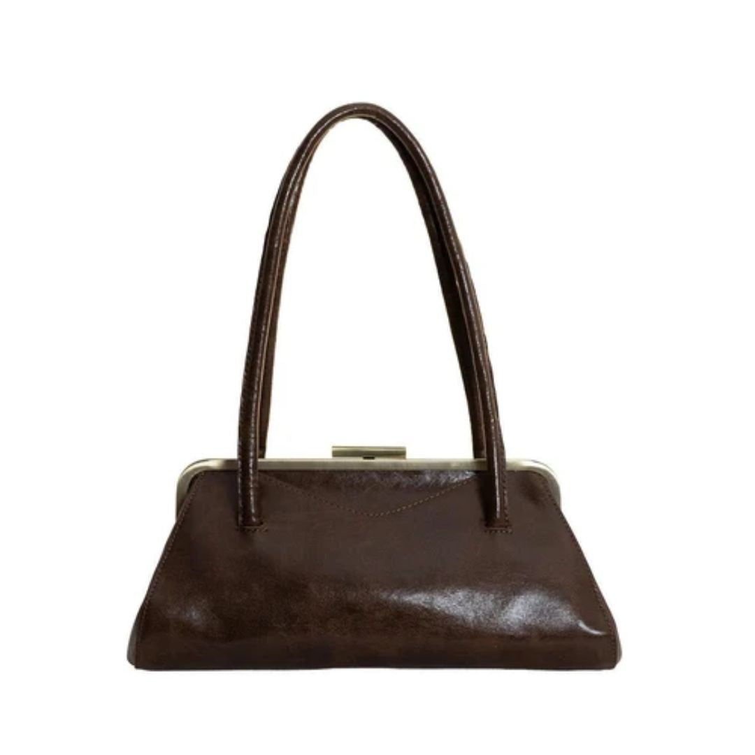 A dark brown faux-leather handbag with a kiss-lock metal clasp and dual top handles, shown against a plain white background.