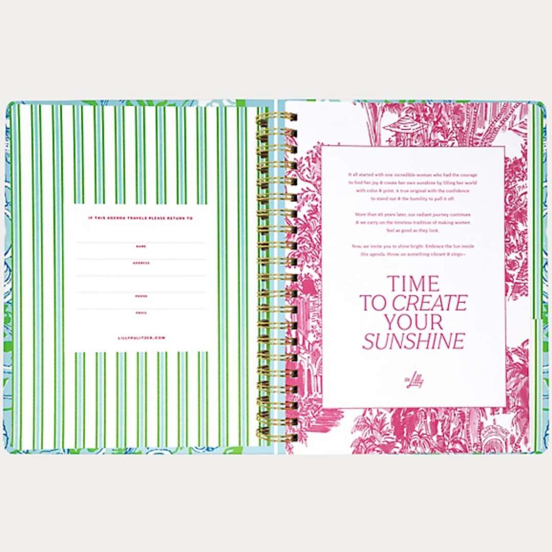 Open planner with colorful design and text on a white background