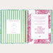 Open planner with colorful design and text on a white background