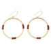 A pair of gold-tone hoop earrings with small brown wrapped accents at the bottom of each hoop, shown on a plain white background.