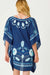 Navy blue cover up with white coastal patterns on a white background