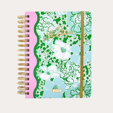 Notebook with floral design and visible brand name on a white background