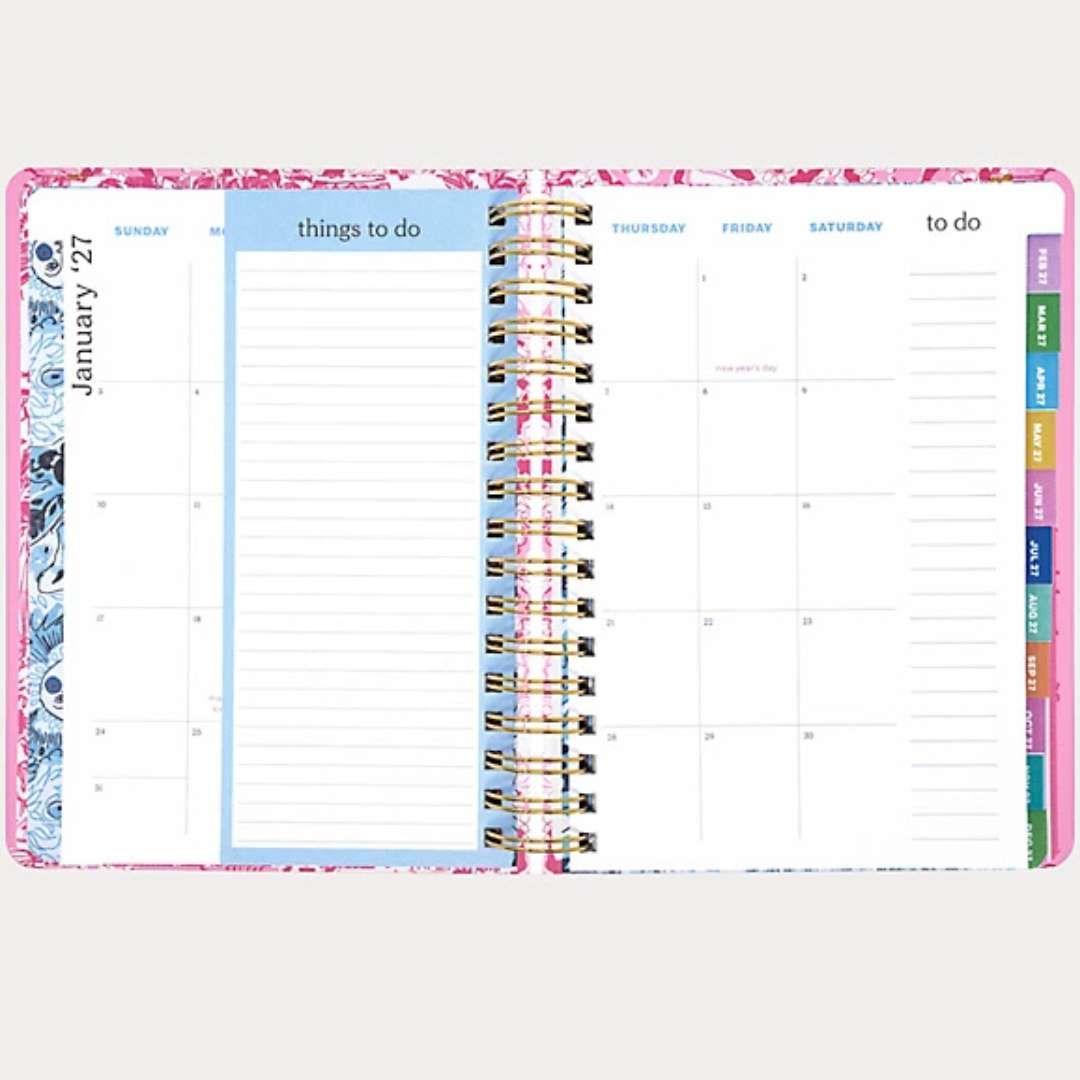 Planner with colorful tabs on a white background