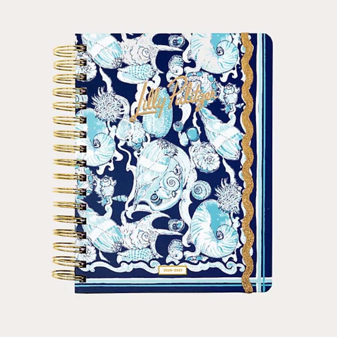 Notebook with seashell design and 'Lilly Pulitzer' branding on a white background