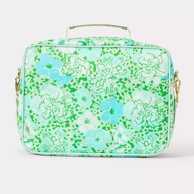 A rectangular lunch bag with a green and light blue floral pattern, featuring a top handle and gold-tone hardware, shown against a plain light gray background.