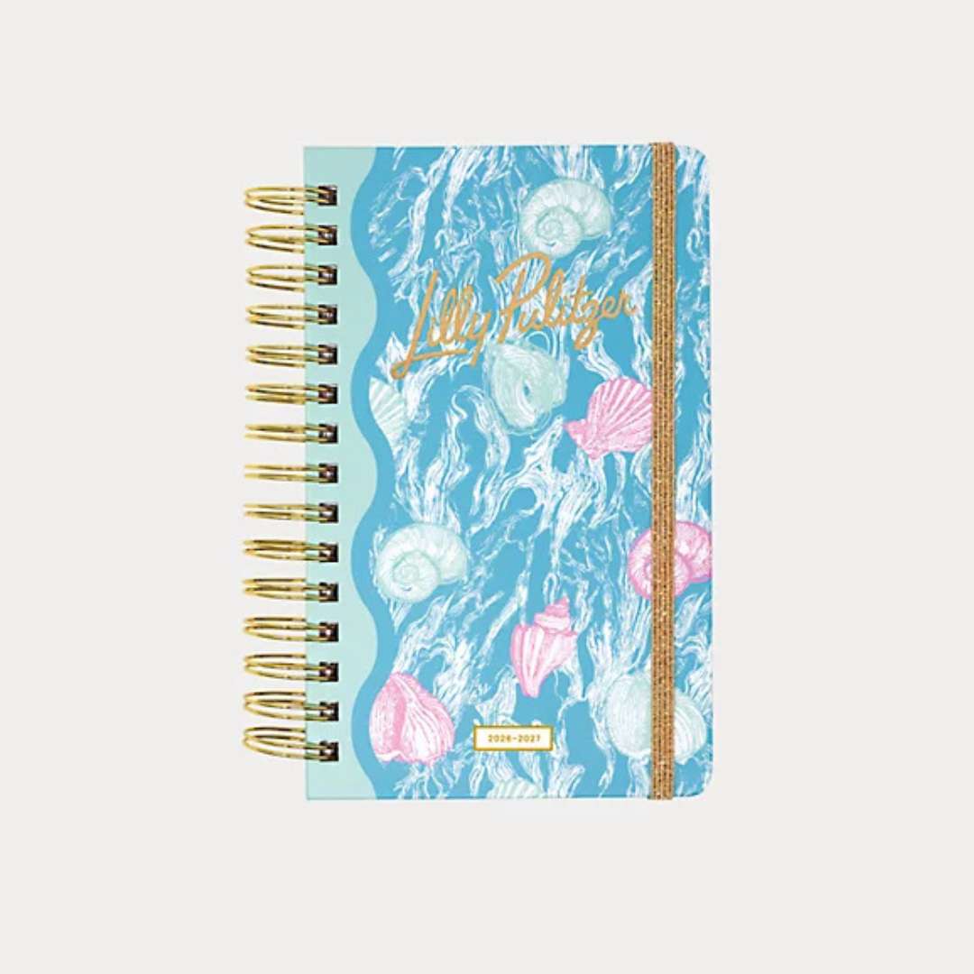 Notebook with a blue cover featuring sea-themed design and 'Lilly Pulitzer' branding.