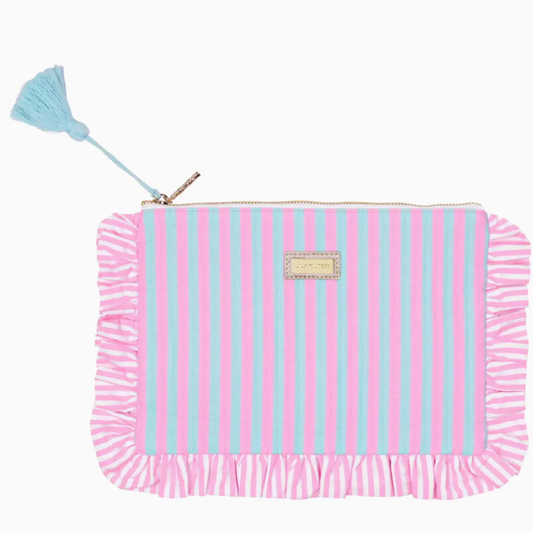 Pink and blue striped pouch with ruffle edge and tassel on a white background