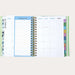 Spiral-bound planner with weekly layout on a white background