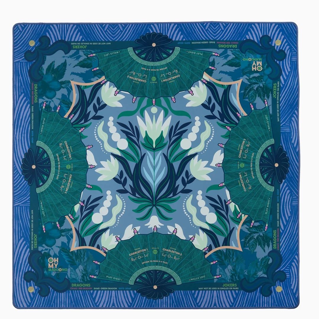 A square silk scarf featuring a symmetrical botanical and fan-like pattern in shades of blue, teal, and green, with white tulips and gold decorative details, shown flat against a white background.