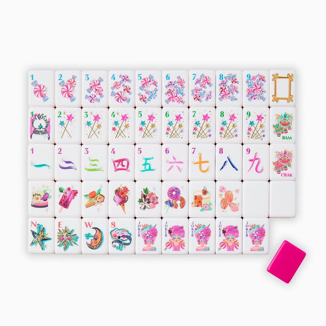 Colorful miniature tiles with cartoon designs on a white background